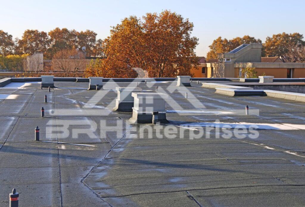 Why do commercial buildings have flat roofs