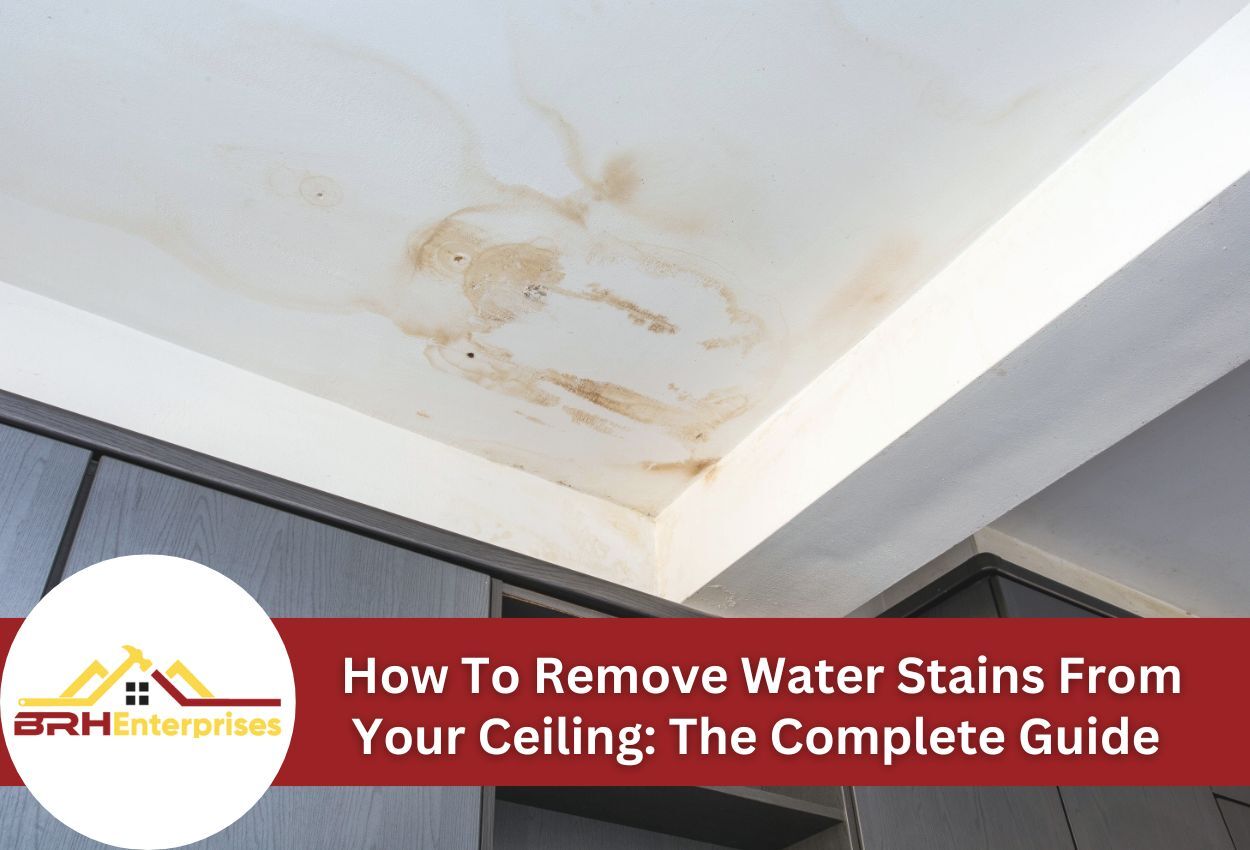 Water damage stains on white ceiling in modern home interior